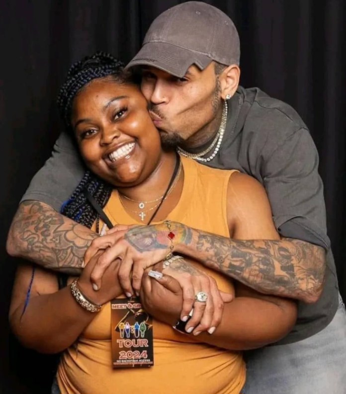 Zambian man files for divorce from wife over photo of Chris Brown kissing his wife’s cheek