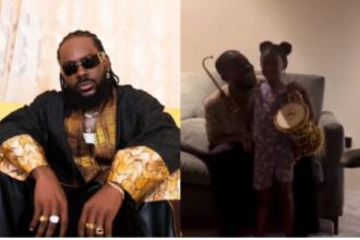 Adekunle Gold Shares Adorable Video Of Daughter Deja Playing Talking Drum