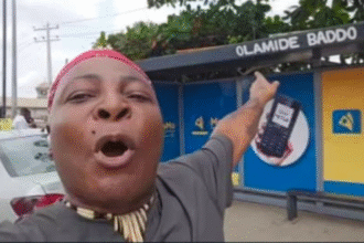 Charly Boy visits newly renamed ‘Olamide Baddo bus stop,’ reacts to change