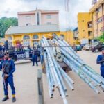 Driver And Motor Boy Flee as NSCDC Intercepts Truck Loaded With Stolen Street Light Poles in Abuja
