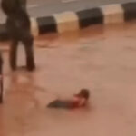 Nigerian Soldiers Force Driver to Swim In Muddy Water In Enugu After His Vehicle Splashed Water on Them (Video)