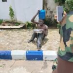 Suspected Thief Goes Viral After Allegedly Being Caught Stealing Pot Of Food, Gas Cylinder And Electric Cooker In Jos