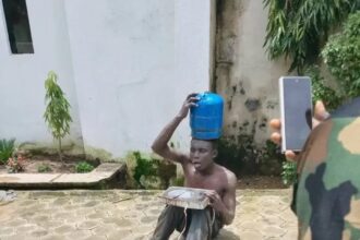 Suspected Thief Goes Viral After Allegedly Being Caught Stealing Pot Of Food, Gas Cylinder And Electric Cooker In Jos
