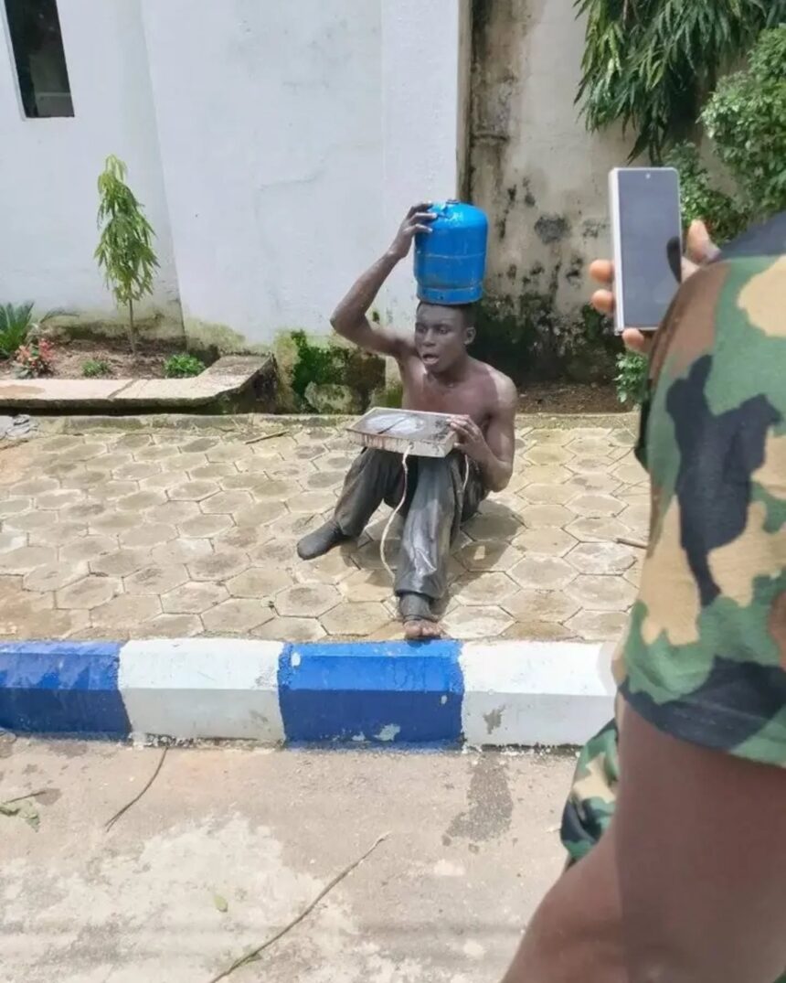 Suspected Thief Goes Viral After Allegedly Being Caught Stealing Pot Of Food, Gas Cylinder And Electric Cooker In Jos