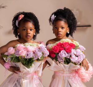 Mom shares creative way she styled her twin girls as flower bouquets for their birthday photoshoot.