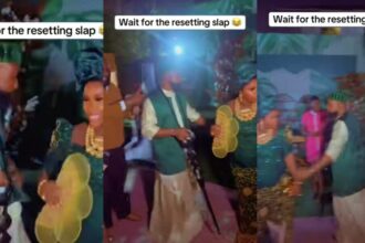 Drama as groom slaps lady after she packed money sprayed on him during wedding dance