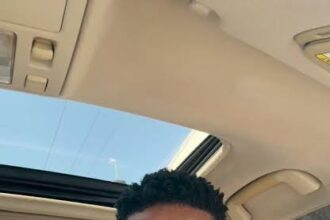 Scott Iguma cries out as his uncle gets kidnapped