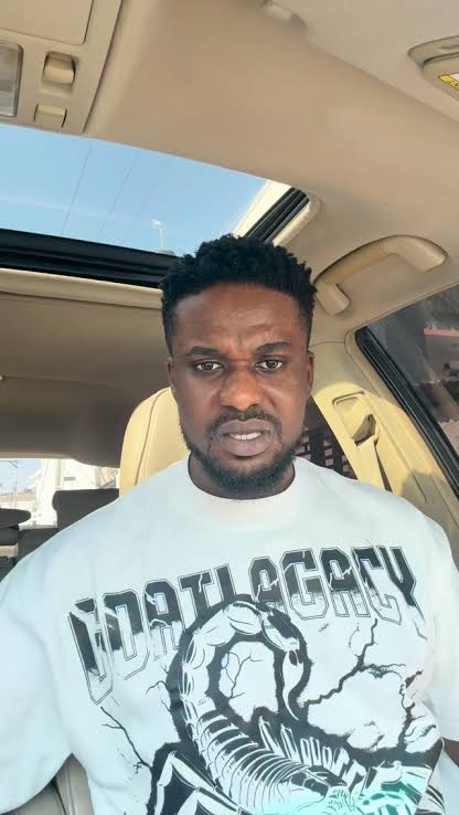 Scott Iguma cries out as his uncle gets kidnapped