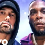 “That Was Not Cool” – Eminem Reacts To Burna Boy Chasing Sleeping Fan From His Concert