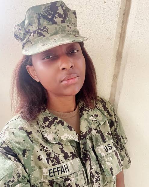 Actress, Grace Charis Bassey disassembling, cleaning her rifle after joining US military