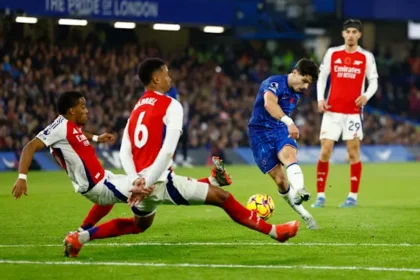 Arsenal hold lead after fiery 1–1 stalemate with Chelsea