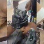 Girlfriend breaks down in tears while tattooing her boyfriend’s name on her hand