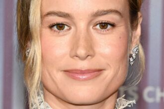 Brie Larson ‘Stacked’ In Plunging Bikini While Paddleboarding On Mexico Lake