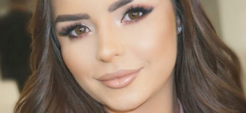 Demi Rose Leans Over Bathroom Sink In Undone String Bikini
