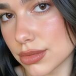 Dua Lipa Told They’re ‘On Show’ In Sheer Braless Shirt