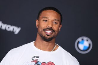 Michael B. Jordan Killmonger Co-Signs David Jonsson As The New ‘Black Panther,’ Drops Deliciously Dapper Trailer For ‘The Thomas Crown Affair’