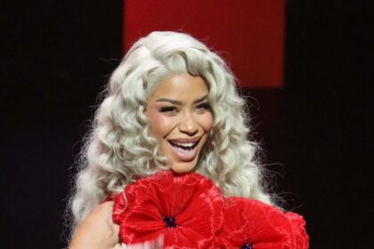 Amaya Espinal Looks ‘Totally Different’ In Fitted Jumpsuit Pics