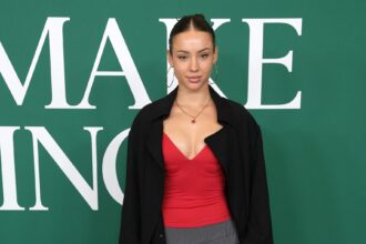 Charly Jordan Serves ‘Poolside Perfection’ In Cheeky Red Bikini