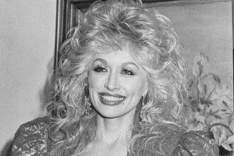 Dolly Parton Through The Years: Her Incredible Life And Career In Photos