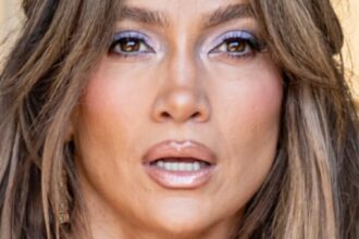 Jennifer Lopez ‘Embarrassing’ In Plunging Bikini Showing Alleged Implants