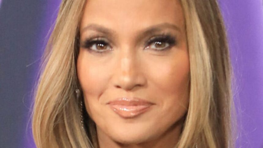 Jennifer Lopez Highlights ‘New Implants’ In Plunging Braless Dress On Water Taxi