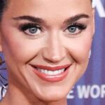 Katy Perry ‘Pregnant’ In Plunging Swimsuit After ‘Putting On Pounds’