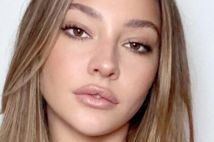 Madelyn Cline Highlights ’10/10′ Looks In Skimpy Bikini On Ocean Swing
