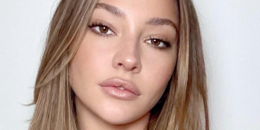 Madelyn Cline Highlights ’10/10′ Looks In Skimpy Bikini On Ocean Swing