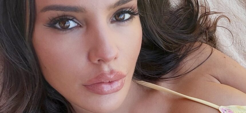 Paige Uncaged In Bathroom String Bikini Wins ‘Rack Of The Century’