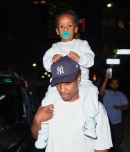 Pure Preciousness: A$AP Rocky Spotted On Daddy Duty In NYC After Family Trip To Barbados