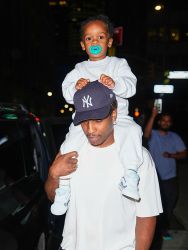 Pure Preciousness: A$AP Rocky Spotted On Daddy Duty In NYC After Family Trip To Barbados