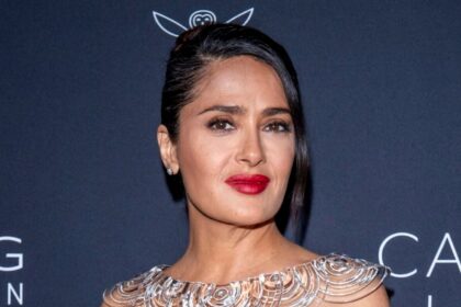 Salma Hayek Swimming In Tiny Orange Bikini Called ‘Most Beautiful Woman’