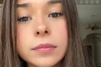 Sophie Rain ‘Can’t Find A Boyfriend’ In Plunging Bedtime Underwear