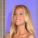 Alix Earle Flaunts Oiled-Up Body In Teeny Cherry Bikini: ‘So Plastic’