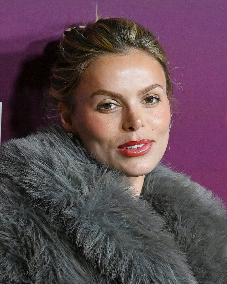 Brooks Nader In White Cut-Out Dress Highlights Bruise From ‘Low Iron’