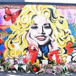 Dolly Parton’s Creative Director Reveals The Promise He Kept To Her For 35 Years: ‘I Will Not Let You Fall’