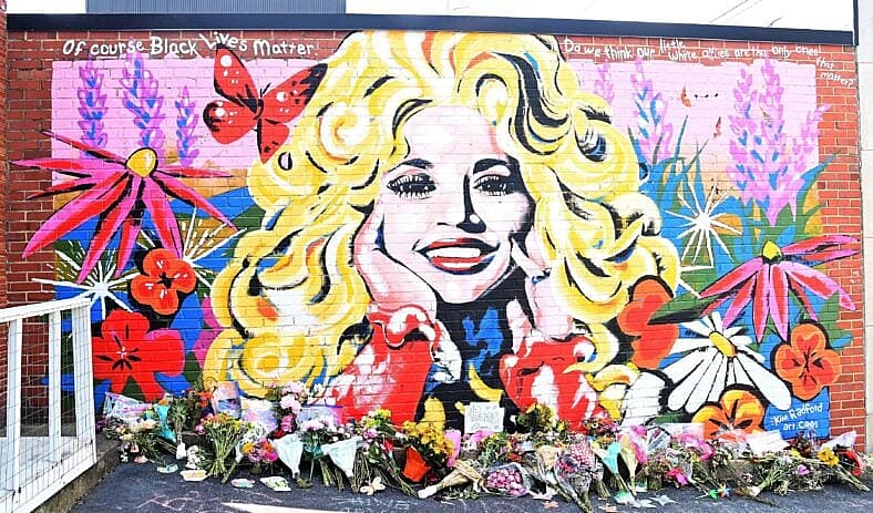 Dolly Parton’s Creative Director Reveals The Promise He Kept To Her For 35 Years: ‘I Will Not Let You Fall’