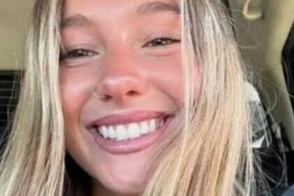 Ella Alexandra Lifts Braless Shirt While Smiling On A London Bridge