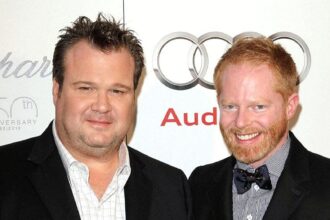 Eric Stonestreet & Jesse Tyler Ferguson Recall They ‘Took The Heat’ On ‘Modern Family’ As A Gay Couple