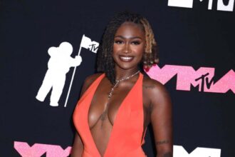 Kaliii’s ‘Tiger Stripes’ In Skimpy Monokini Called ‘Yummy’