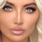 Lindsey Pelas Highlights Her ‘Organic Melons’ In Plunging Swimsuit On A Swing