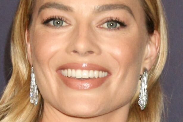 Margot Robbie Shows ‘Unreal Thighs’ In Unbuttoned Swimsuit In Hawaii Ocean